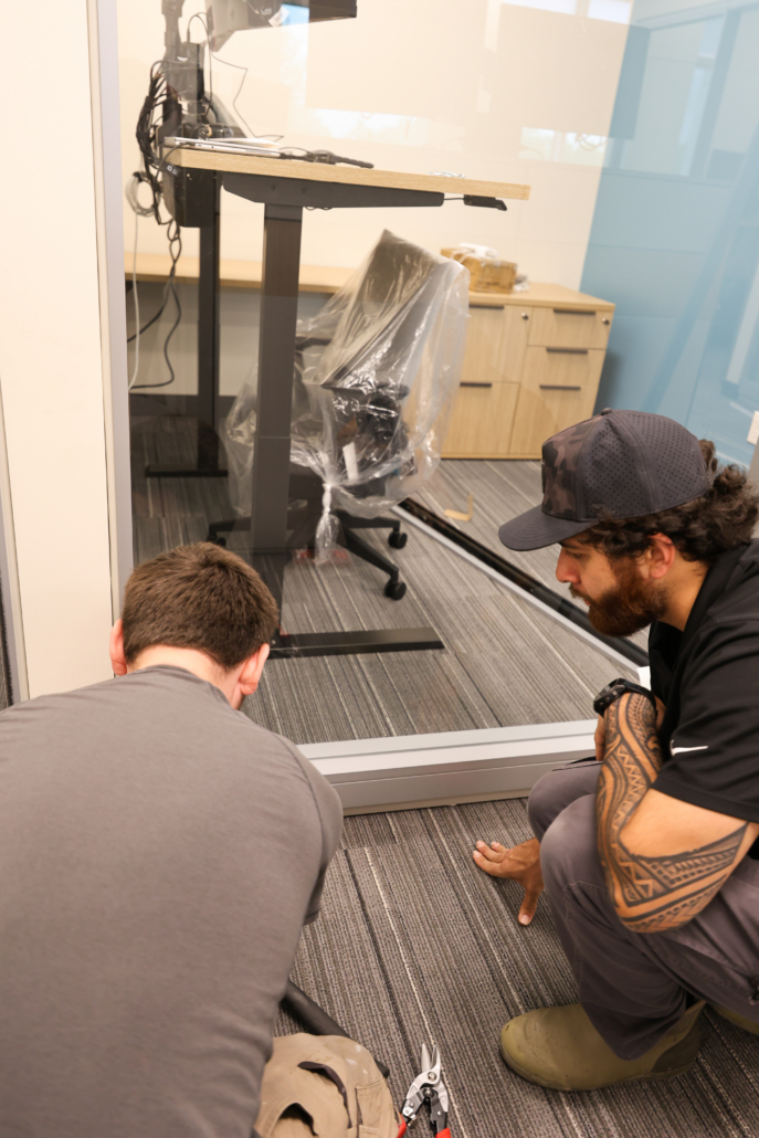 Systemcenter Alaska installation team building Haworth Enclose modular wall glass store fronts at Edward Jones Anchorage Office in SIRI building