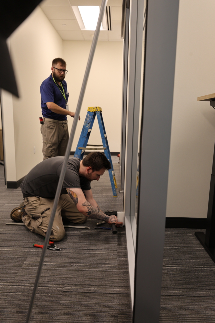 Systemcenter Alaska installation team building Haworth Enclose modular wall glass store fronts at Edward Jones Anchorage Office in SIRI building