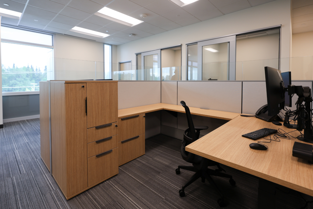 Edward Jones Anchorage Office in SIRI building workstation and private office area with Haworth Enclose modular glass wall store fronts